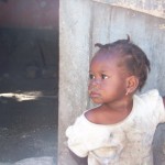 Little girl in voodoo village Little girl in voodoo village