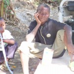 Boys outside mission house