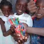 Giving crayons to kids Giving crayons to kids