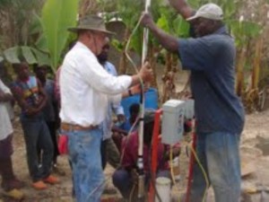 David Heady putting in submersible pump