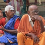 People on street aound temple