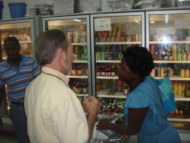 Bro. Chuck & Ginette buying groceries