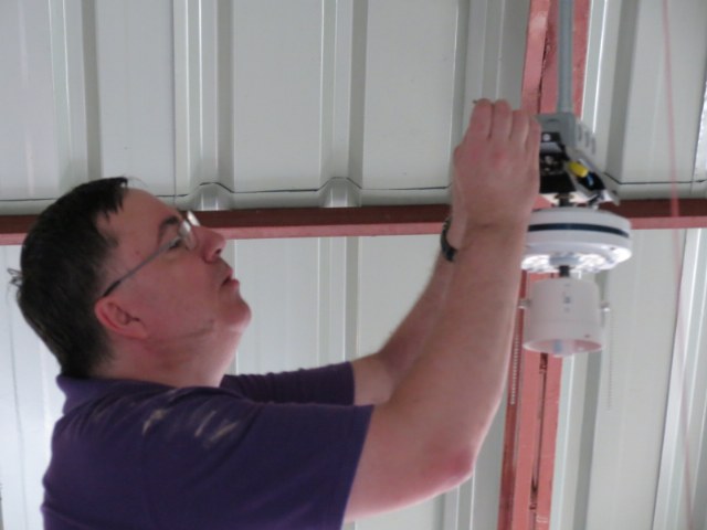 Sean working on ceiling fan
