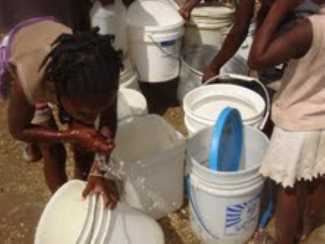 Filling buckets of water