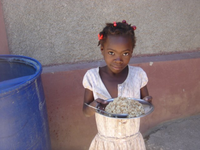 Little girl happy to have food