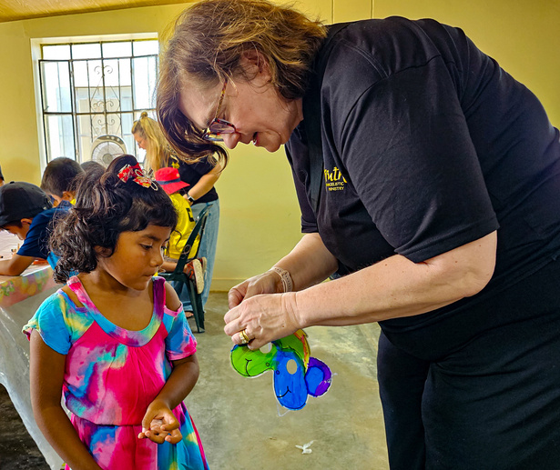 Visiting children on mission trip